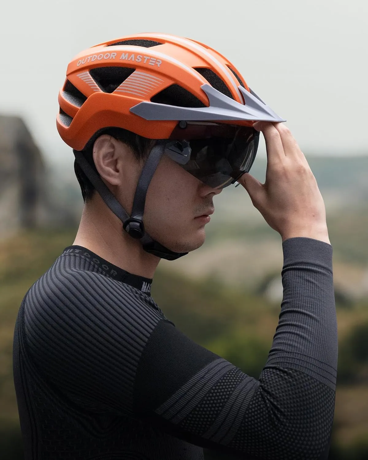 OutdoorMaster Adult Bike Helmet - Bicycle Helmet with Rechargeable Rear LED Light, Detachable Magnetic Goggles, Removable Sun Visor - Suitable for Commuting and Cycling for Men and Women