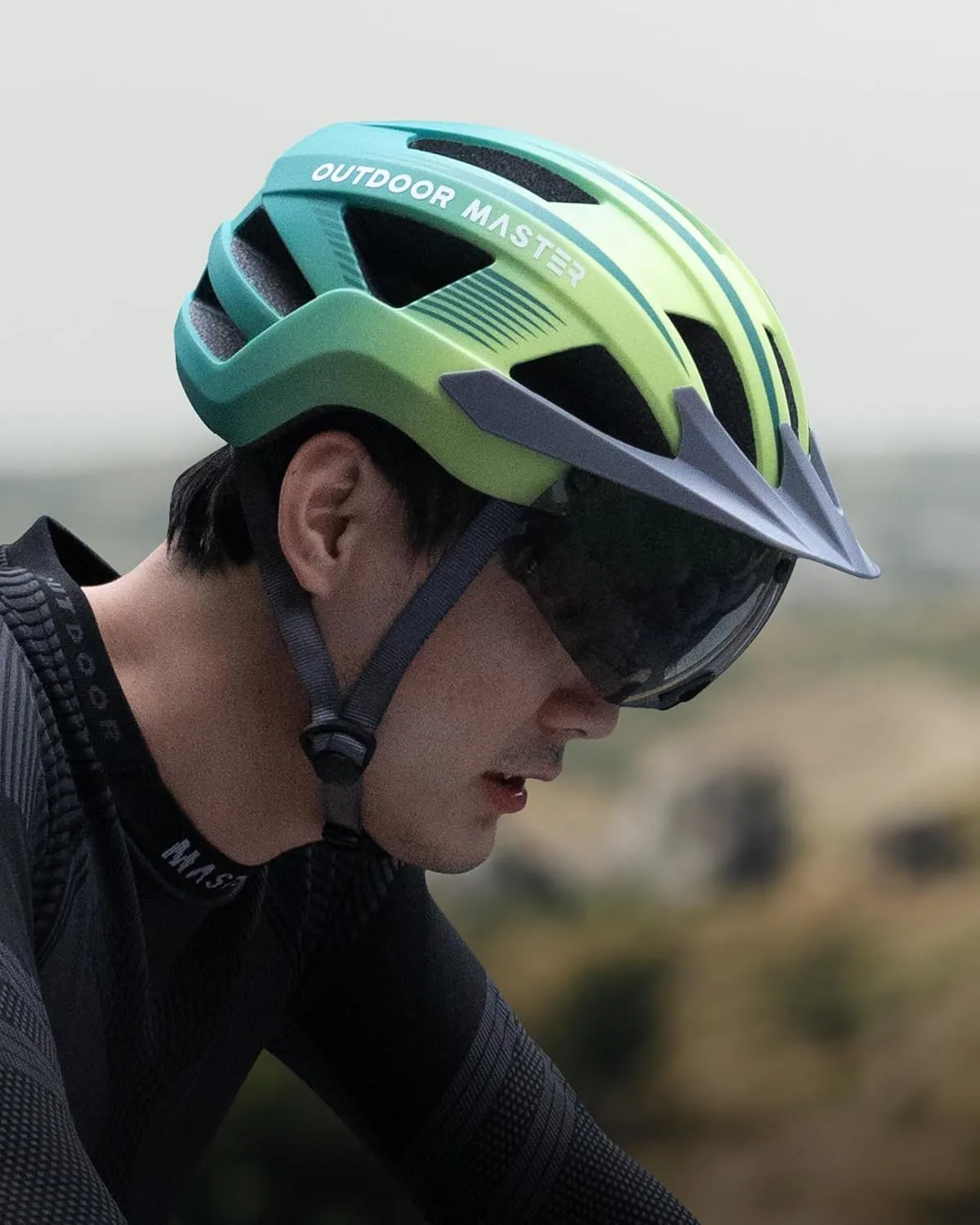 OutdoorMaster Adult Bike Helmet - Bicycle Helmet with Rechargeable Rear LED Light, Detachable Magnetic Goggles, Removable Sun Visor - Suitable for Commuting and Cycling for Men and Women
