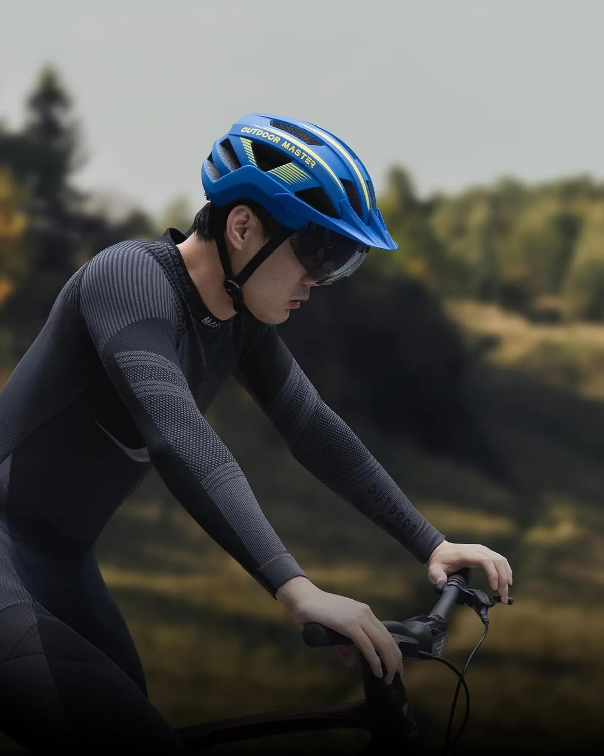 OutdoorMaster Adult Bike Helmet - Bicycle Helmet with Rechargeable Rear LED Light, Detachable Magnetic Goggles, Removable Sun Visor - Suitable for Commuting and Cycling for Men and Women