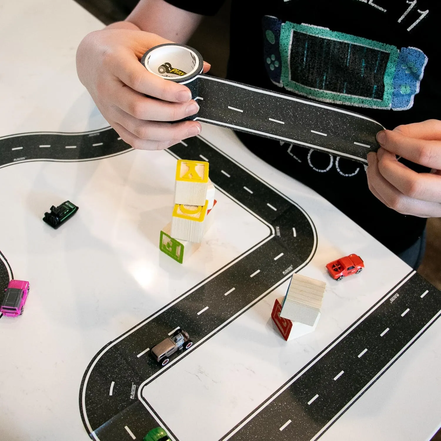 PlayTape Road Tape for Toy Cars - Sticks to Flat Surfaces; No Residue; 4-Pack of 30 ft. x 2 in. Asphalt Road
